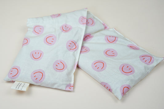 Längliches Wärmekissen Smiley Rosa